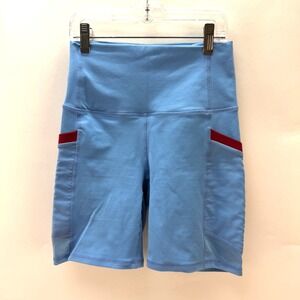 Fabletics On-the-Go Ultra High-Waisted 7" Short surf blue cherry Burst size XS